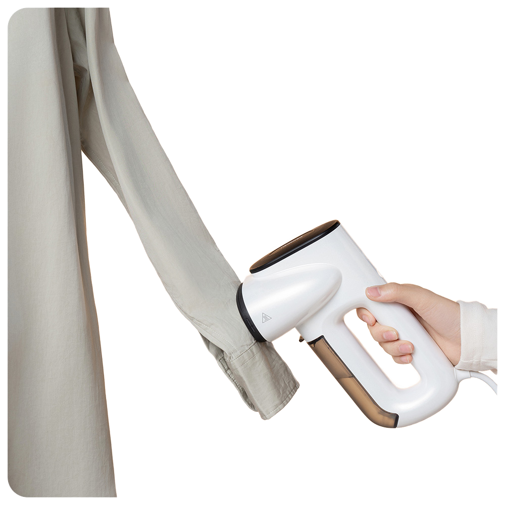 ✨ المكواة البخارية الذكية… مغناطيس سحري للملابس  ✨